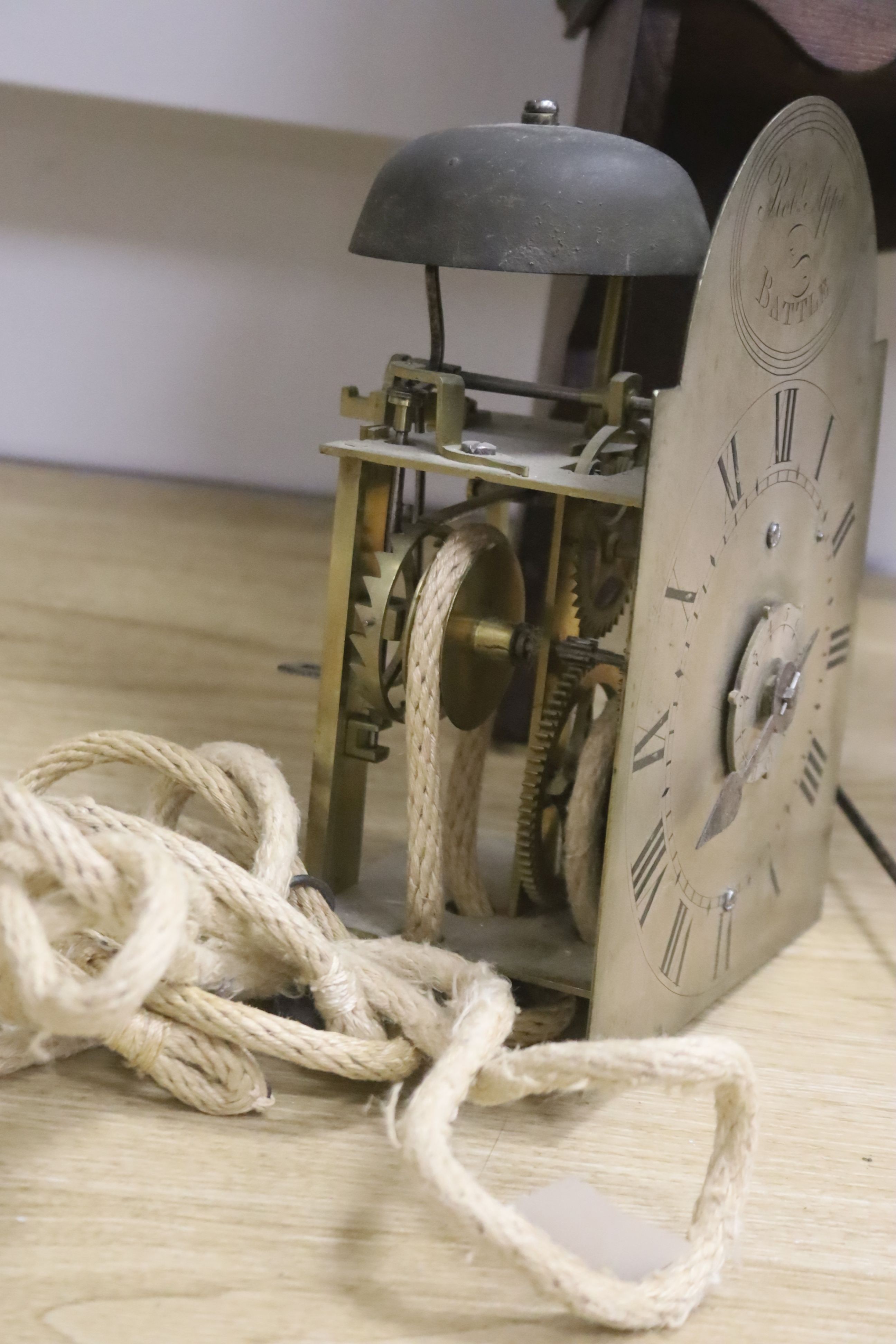 A pine hooded wall alarm clock by Robert Apps of Battle, case 57cm